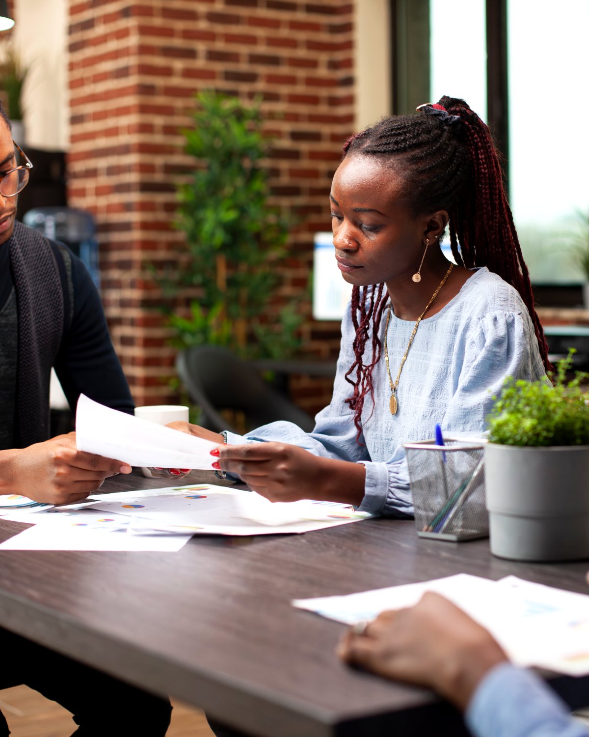 A team reviewing management accounts around a table
